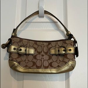 Coach small handbag with strap